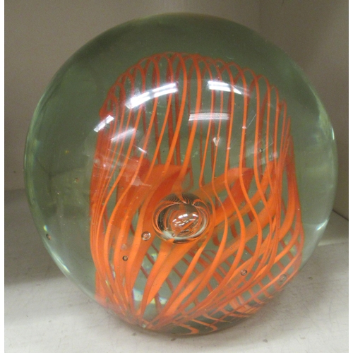 101 - A glass paperweight with integral swirled decoration  6