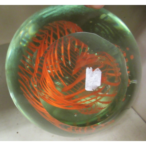 101 - A glass paperweight with integral swirled decoration  6