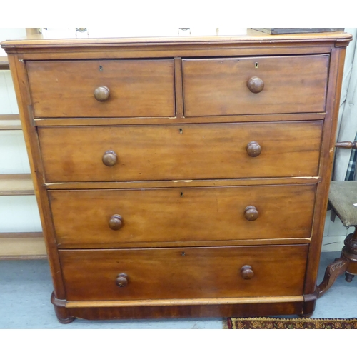 106 - A late Victorian mahogany dressing chest with round corners, comprising two short/three graduated lo... 