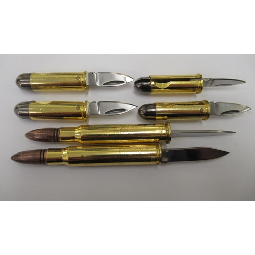 111 - Six lacquered brass penknives, each fashioned as a bullet