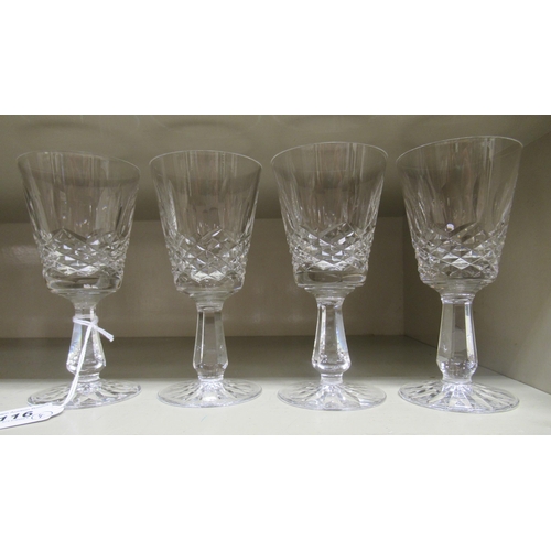 116 - A set of four Waterford crystal Lismore pattern stemmed wine glasses 