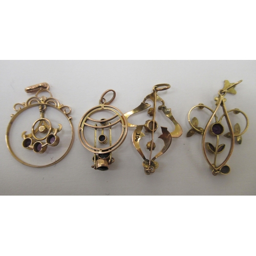 117 - Four gold coloured metal open frame pendants, variously set with coloured stones 