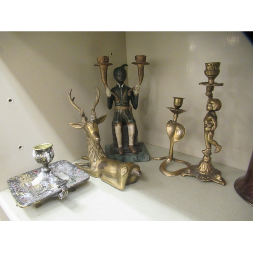 123 - Metalware: to include a cast metal candelabrum, fashioned as an Indian gentleman, holding two torche... 