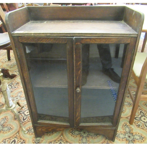 185 - Small furniture: to include a 1920s oak two door side cabinet, raised on bracket feet  35