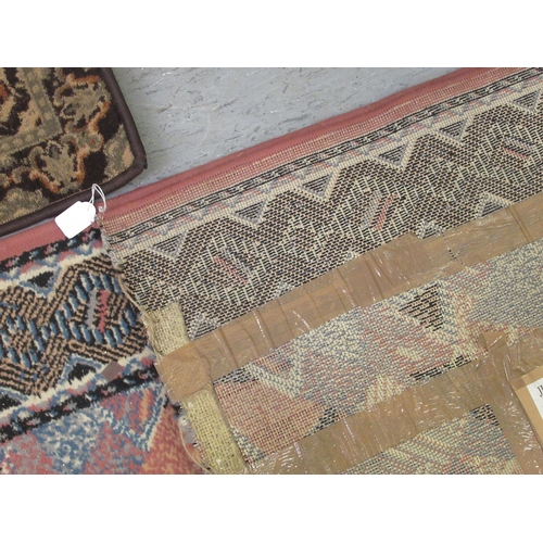 189 - An (off-cut) machine made runner, decorated in 1970s taste on a multi-coloured ground  32