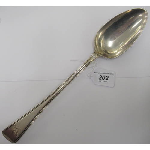 202 - A George III silver Old English and thread pattern basting spoon  William Collins  London ... 