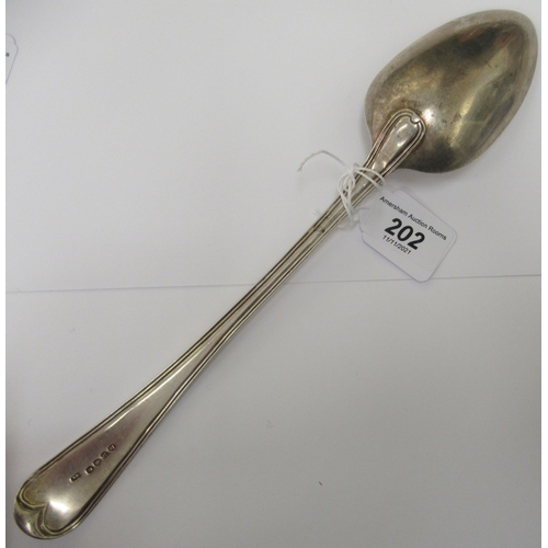 202 - A George III silver Old English and thread pattern basting spoon  William Collins  London ... 