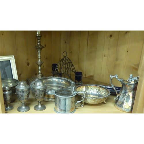 207 - Silver plated and white metal tableware: to include a strainer spoon; a wine coaster; condiments vas... 