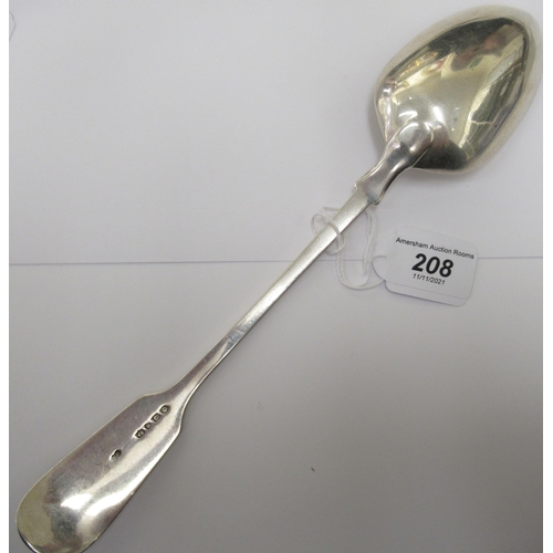 208 - A Victorian silver fiddle and shell pattern basting spoon  George Aldwinckle  London 1869