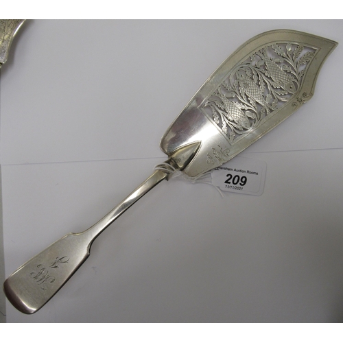 209 - An early Victorian silver fiddle pattern fish slice, the blade pierced, engraved and chased with fis... 