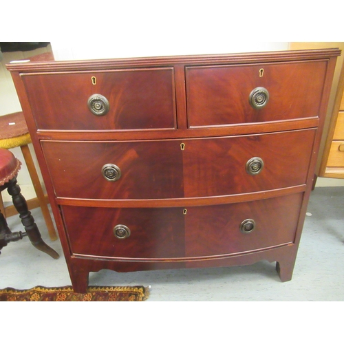 219 - A 19thC style mahogany bow front four drawer dressing chest, raised on bracket feet  30