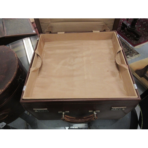 224 - An Edwardian lady's stitched and moulded brown hide stitched and lined hat box; and gentleman's vale... 