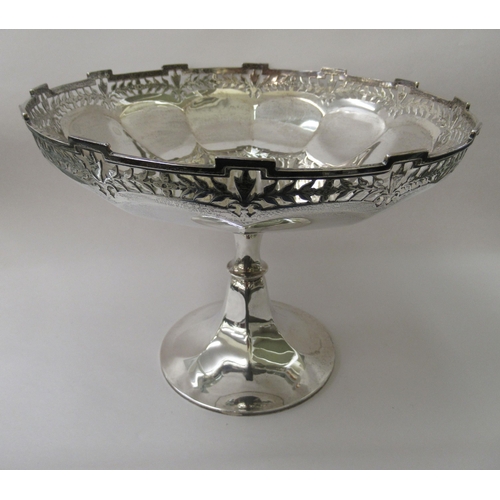 230 - A lobed silver cake dish with a uniformly pierced and stepped rim, elevated on a waisted, conical fo... 