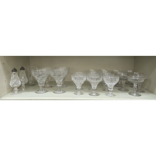 231 - Decorative glassware: to include stemmed, engraved sundae dishes 