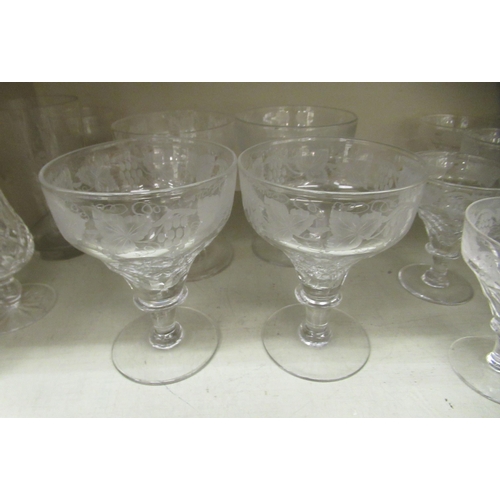 231 - Decorative glassware: to include stemmed, engraved sundae dishes 