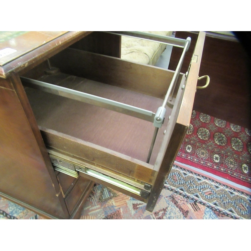 235 - A modern mahogany finished two drawer filing cabinet, raised on bracket feet  31