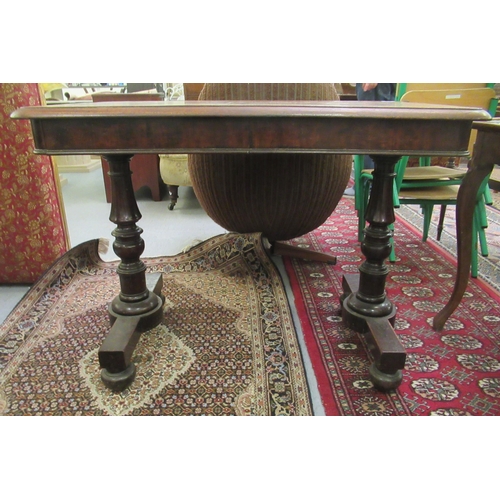 236 - A late Victorian mahogany centre table, raised on opposing turned columns and platform feet  29... 