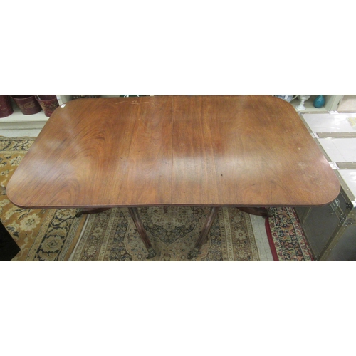 238 - An early 20thC Regency style mahogany dining table, raised on twin pedestals with splayed sabre legs... 