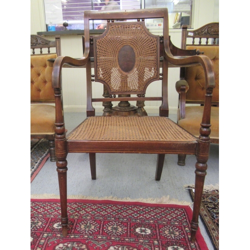 240 - An Edwardian Shoolbred & Co satinwood inlaid mahogany bedroom chairs with a caned seat, raised o... 