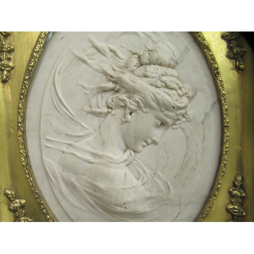 243 - A modern composition marble effect plaque, depicting a female figure  16