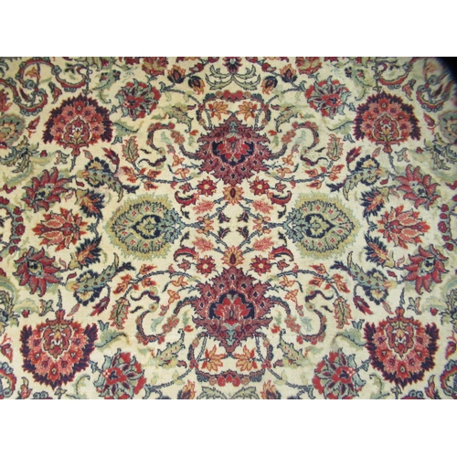 248 - A Persian design rug, decorated with repeating floral motifs, on a beige ground  100