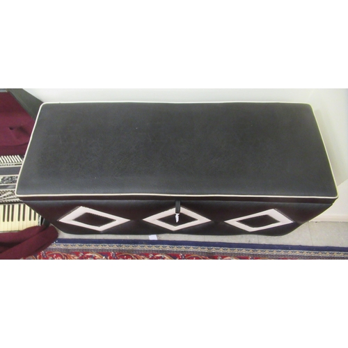 256 - A modern black and cream coloured stud upholstered hide ottoman with straight sides and a hinged lid... 