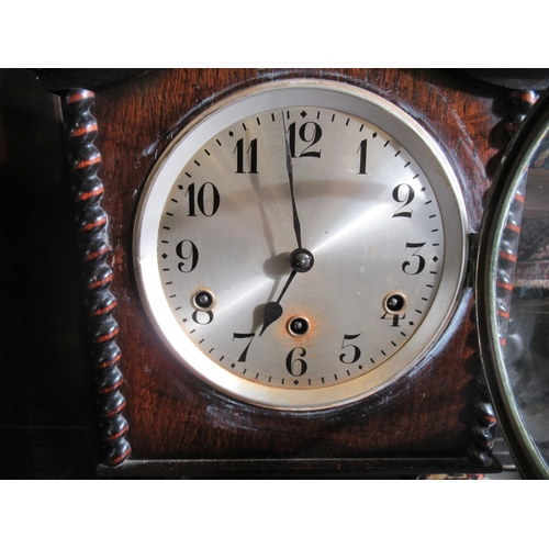 270 - A 1930s oak cased granddaughter clock; the 8 day movement faced by a silvered Arabic dial  50