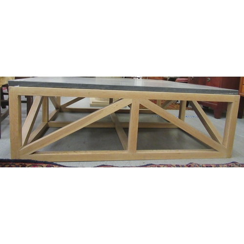 65 - A modern light oak framed coffee table with a grey mottled marble top  17