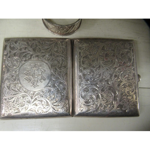 73 - Silver collectables: to include a late Victorian cigarette case with an engraved hinged body  C... 