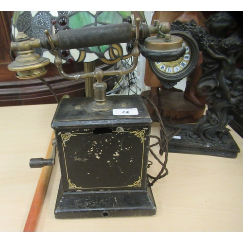 74 - A mixed lot: to include an early 20thC painted metal and wooden telephone  13