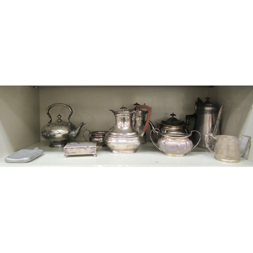 98 - Silver plate: to include a late Victorian hot water jug with an ear shaped handle 