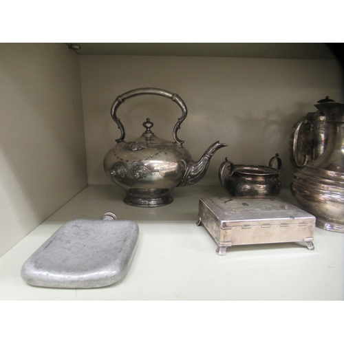 98 - Silver plate: to include a late Victorian hot water jug with an ear shaped handle 