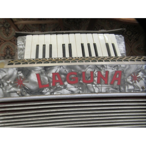 258 - A Laguna twelve key grey marble effect cased piano accordion 