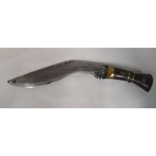 132 - An Indian kukri with a part brass bound handle, the blade 13.5