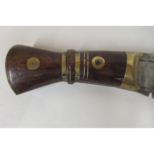 132 - An Indian kukri with a part brass bound handle, the blade 13.5