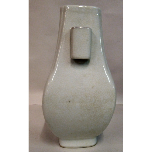 134 - An early 20thC Chinese blanc-de-chine Hu shaped vase with a peach design body and opposing handles  ... 
