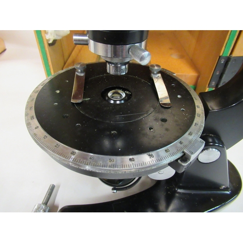 137 - A Czech Republic Meopta black enamel and stainless steel microscope, no.176749 with attendant fittin... 