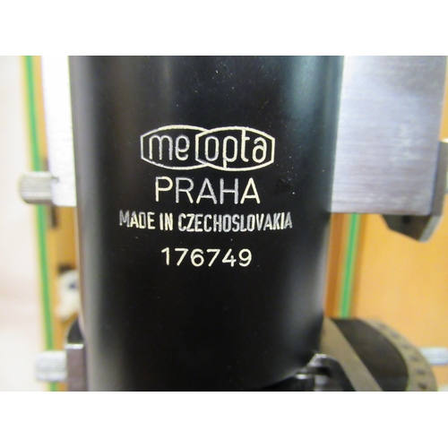 137 - A Czech Republic Meopta black enamel and stainless steel microscope, no.176749 with attendant fittin... 