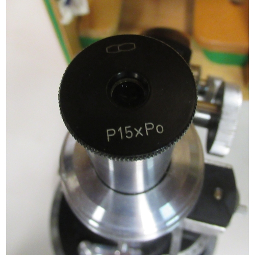 137 - A Czech Republic Meopta black enamel and stainless steel microscope, no.176749 with attendant fittin... 