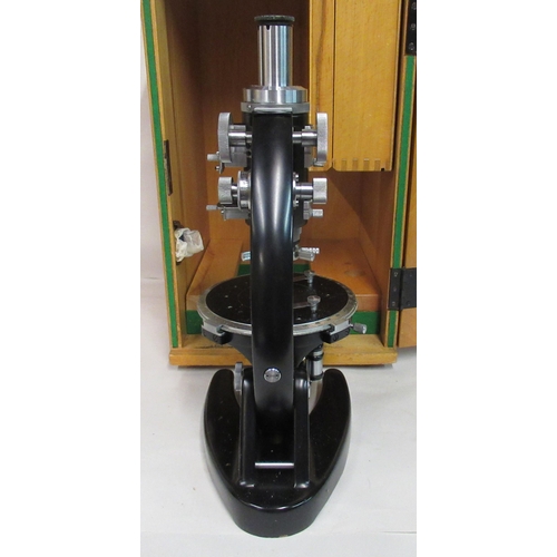 137 - A Czech Republic Meopta black enamel and stainless steel microscope, no.176749 with attendant fittin... 