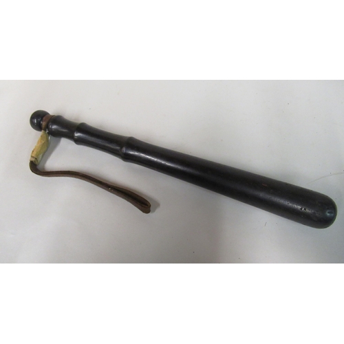 140 - A military style brass bugle with a tasselled cord; a huntsman's coiled copper and brass horn; and a... 