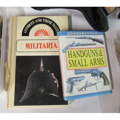 141 - Miscellaneous military and associated objects and printed ephemera: to include a buckled soft black ... 