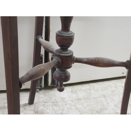 168 - An Edwardian mahogany three tier cake stand, raised on splayed legs  37