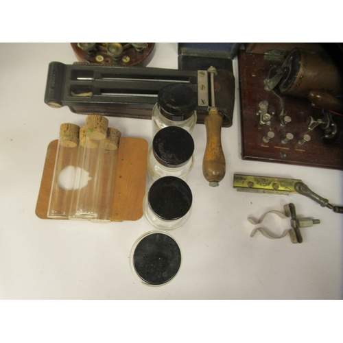 171 - Various unidentified scientific instruments: to include a 1915 Marconi lacquered brass cased tester;... 