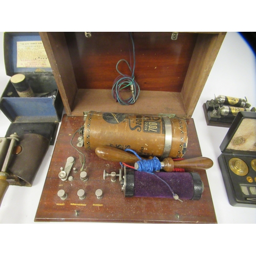 171 - Various unidentified scientific instruments: to include a 1915 Marconi lacquered brass cased tester;... 
