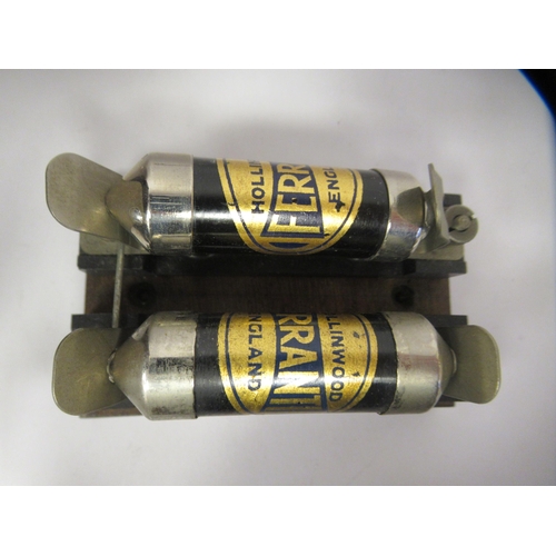 171 - Various unidentified scientific instruments: to include a 1915 Marconi lacquered brass cased tester;... 