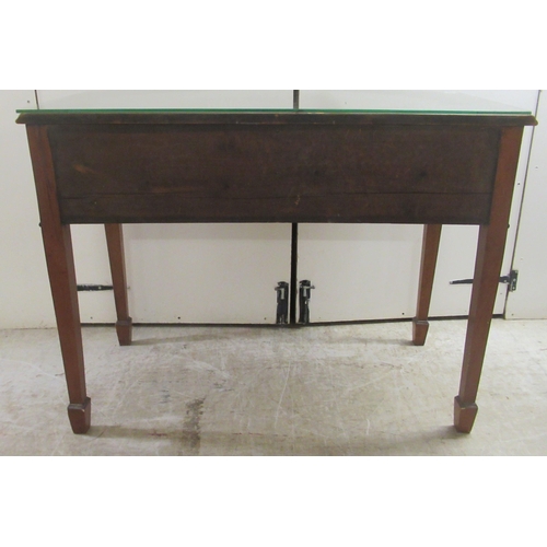 172 - An early 20thC mahogany bow front, two drawer sideboard, raised on square, tapered legs and spade fe... 