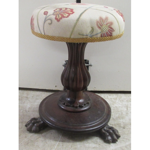 177 - A William IV rosewood music stool, the later fabric upholstered top raised on a bulbous, reeded pede... 
