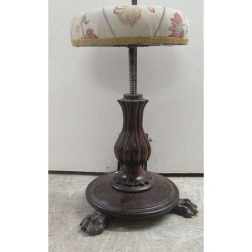 177 - A William IV rosewood music stool, the later fabric upholstered top raised on a bulbous, reeded pede... 