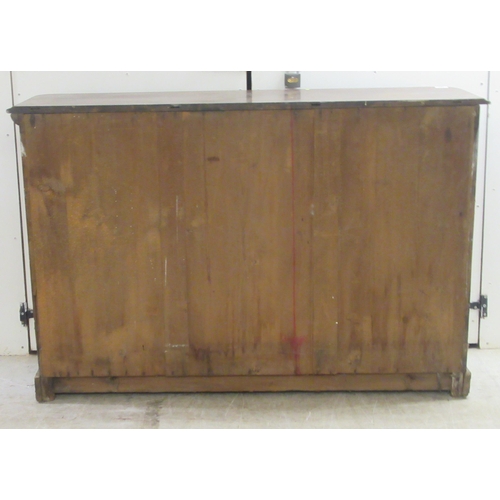 192 - A mid 19thC stained oak, open front, two tier bookcase, on a plinth   35